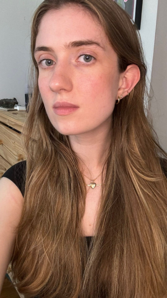 Selfie of Annie Blackman after using the Dyson hair dryer with smooth blownout hair